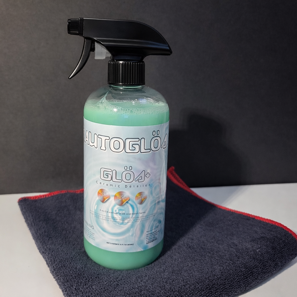 Autoglos car care product with a spray nozzle on a gray surface